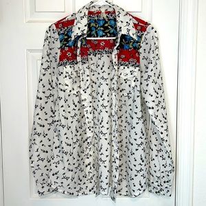 Roper Women’s cashmere button up top.